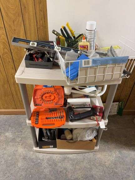 Shelving Unit with Shopwares vise grips clamps screw drivers image