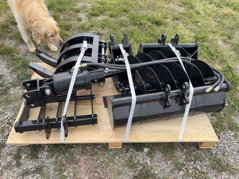 Pallet of (9) Mini Excavator Attachments - (1) 8” Bucket, (1) 20” Bucket, (1) 32” Bucket, (1) Quick Coupler, (1) Ripper, (1) Grapple, (1) Rake, (1) 8” Auger, (1) 12” Auger image