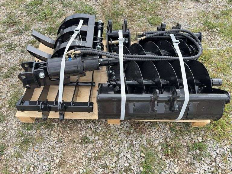 Pallet of (9) Mini Excavator Attachments - (1) 8” Bucket, (1) 20” Bucket, (1) 32” Bucket, (1) Quick Coupler, (1) Ripper, (1) Grapple, (1) Rake, (1) 8” Auger, (1) 12” Auger image