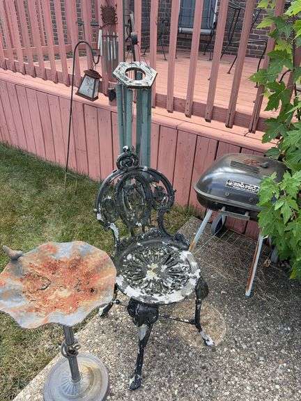 Assorted Wind chimes, Patio Chair (not wrought iron), bird bath, grill image