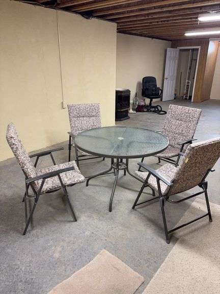 Outdoor Table 43”x28” and 4 Chairs - located in basement, buyer responsible for removal image