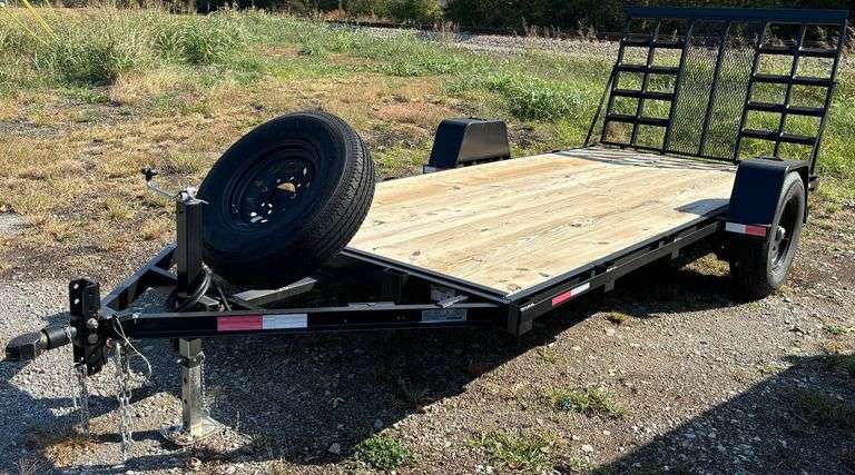 2025 HEAVY-DUTY TRAILER SET UP FOR A MINI EXCAVATOR OR SKID STEER. EQUIPPED WITH AN 8,000 LB BRAKE AXLE, STRONG HD FRAME, HEAVY-DUTY GATE, STAKE POCKETS, AND DROP-DOWN 8,000 LB JACK. HAS LED LIGHTS, ADJUSTABLE BULLDOG COUPLER, AND COMES WITH A SPARE TIRE. 70” X 14’