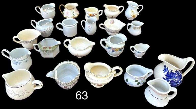 LARGE LOT OF CREAM PITCHERS (SOME AS-FOUND) TO INCLUDE KNOWLES, RUDOLF ZIBELL ESKILSTUNA, HOMER LAUGHLIN, GREEN LETTER JAPAN, YELLOW GLASS PEAR PATTERN, USA POTTERY, SHENANGO CHINA USA, BUFFALO CHINA USA, MATCHING JAPAN DRIP PATTERN CREAM AND SUGAR, MULTICOLORED DRIP WARE, CLINCHFIELD ERWIN TN CORN PATTERN, SANGO KOREA, ARTIST SIGNED CLAY, CANTINA ARE CHINA, MIKASA, BUFFALO CHINA USA, MID-CENTURY MODERN, CASH FAMILY ERWIN TN (CRACKED), KAISER, WALKER CHINA BEDFORD OH, KUTANI JAPAN, HARMONY HOUSE WOODHUE, GERMANY, NAUTILUS, AND MORE image