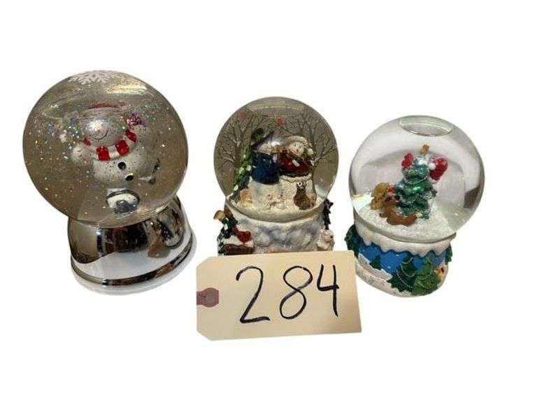 3 SNOW GLOBES - 1 SKATING SNOWMAN, 1 WIND UP MUSICAL GLOBE WITH SNOWMEN AND FOREST ANIMALS, 1 MARKED HALLMARK WITH SNOWMAN, CHRISTMAS TREE AND FOREST ANIMALS image