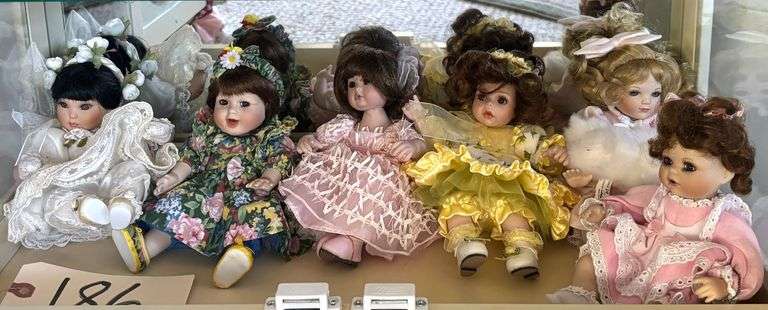 LOT OF 6 MARIE OSMOND TINY TOT 8 INCH PORCELAIN COLLECTOR DOLLS - HAVE BEEN KEPT INSIDE A GLASS DOOR CASE, LIKE NEW, ACCESSORIES INCLUDED image