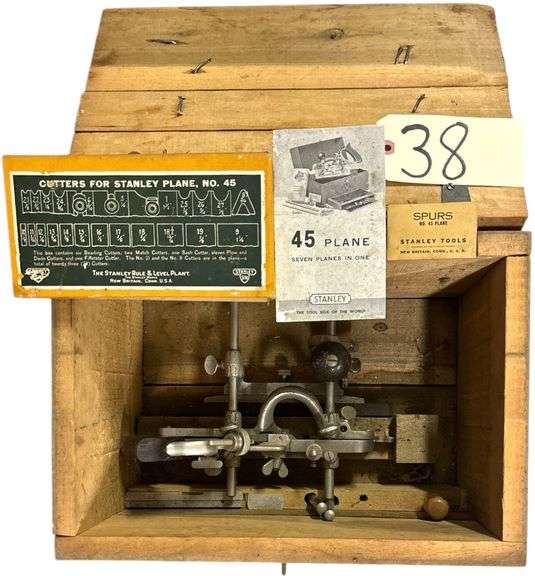 STANLEY NO. 45 COMBINATION PLANE WITH ORIGINAL WOODEN STORAGE BOX, CUTTERS, SPURS, AND INSTRUCTION MANUAL image
