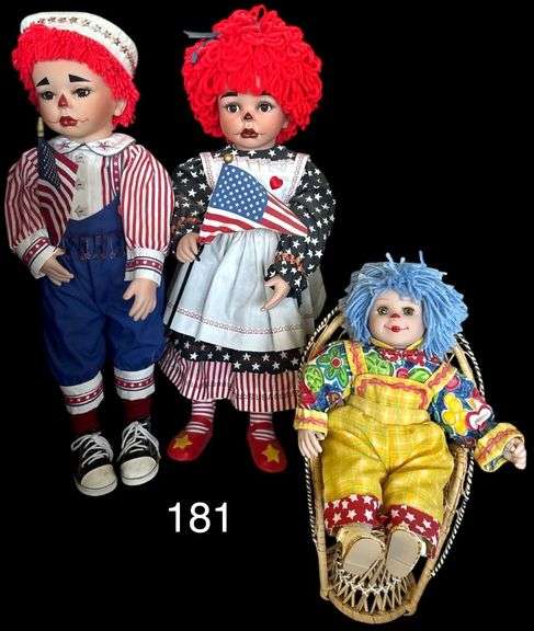 PATRIOTIC PORCELAIN RAGGEDY ANN AND ANDY (APPEAR TO BE MADE BY PARADISE GALLERIES) MARKED #273 APPROX. 24”, OTHER SMALL VINYL CLOWN FIGURINE W/ CHAIR image