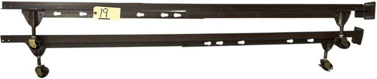 METAL BED FRAME ON ROLLERS - APPROX. 48” WIDTH X 6’ LENGTH - 2 WOODEN SLATS INCLUDED image