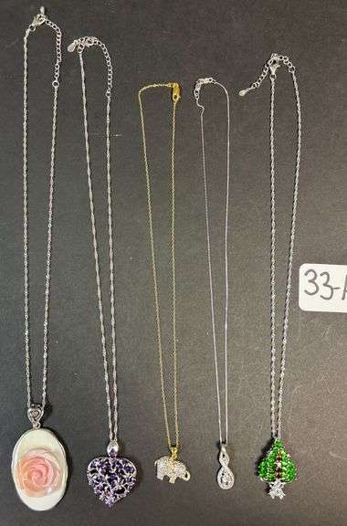 5 NECKLACES AND PENDANTS, ELEPHANT HAS ROUND DIAMOND ACCENTS, 18K GOLD OVERLAY ON STERLING, WHITE ROUND SAPPHIRE RHODIUM OVER STERLING, 3 OTHERS IN STERLING SILVER - 1.29 TROY OZ, 40.34 GRAMS TOTAL image