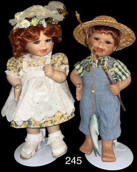 TWO PORCELAIN MARIE OSMOND DOLLS ON STANDS: 2004 147/1500 BOY IN OVERALLS FISHING PLUS GIRL WITH BUTTERFLY NET image