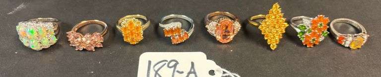 8 STERLING SILVER RINGS, SOME ORANGE SUN STONES AND OTHERS, VARYING STYLES OF RINGS - 1.15 TROY OZ, 35.91 GRAMS - SIZES 5-7 image
