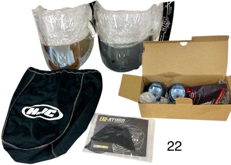 4 HJC HJ07 FACE SHIELDS - 2 CLEAR IN ORIGINAL PACKAGING, 2 TINTED; PAIR OF NILIGHT HALOGEN LIGHTS; SCORPION EXO-AT950 HELMET COMPONENTS image