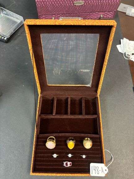 FASHION JEWELRY RINGS, 3 LARGE SIZE WITH ONE CAMEO, 1 PINK STONE AND 1 AMBER STONES, 3 SOLITAIRE RINGS, 1 RING WITH RUBY STONES - RUBY SIZE 5, SOLITAIRE 5 1/2, 7 AND 8, OTHER SIZES ARE 2 5 1/2 AND 1 6 1/2 - IN GLASS TOP JEWELRY BOX image