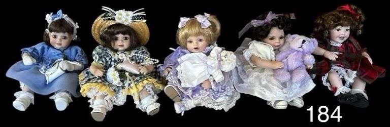 LOT OF 5 MARIE OSMOND 8 INCH TINY TOT PORCELAIN COLLECTOR DOLLS - HAVE BEEN KEPT INSIDE A GLASS DOOR CASE, LIKE NEW, ACCESSORIES INCLUDED image