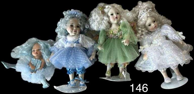 4 MARIE OSMOND PORCELAIN DOLLS - 3 ON STANDS - ALL MARKED AND APP. 8-9 INCHES TALL image