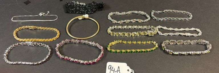 12 STERLING 925 BRACELETS W/ VARIOUS STONES TO INCLUDE EMERALD, AMBER, MULTICOLOR, RUBY RED, BLACK, ETC. image