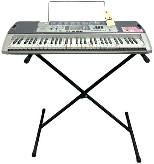 CASIO LK-100 KEY LIGHTING SYSTEM KEYBOARD WITH 100 SONG BANK, 3-STEP LESSON FUNCTION, AND MIDI COMPATIBILITY - WORKING image