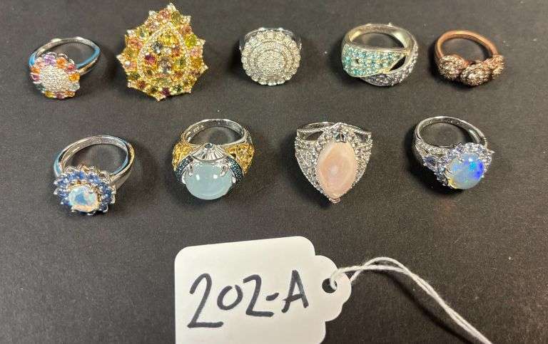 9 STERLING SILVER RINGS W/ PINK, SOME OPAL STONES, SOME CLUSTER CUT, SOME MULTICOLOR - 53.71 GRAMS, 1.72 TROY OZ W/ STONES - SIZES 5-8 image