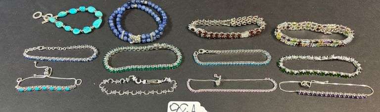 12 STERLING 925 BRACELETS W/ VARIOUS STONES INCLUDING RUBY RED, PURPLE AMETHYST, PINK, JADE, SAPPHIRE, ETC. image