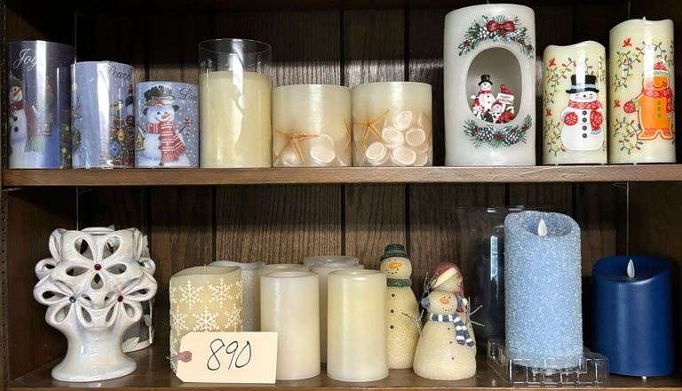 TWO SHELVES OF CANDLES - SOME HOLIDAY, SOME BLUE, SNOWMEN, CERAMIC STUDDED CANDLE HOLDER, ETC. - AT LEAST 3 MARKED LUMINARA image