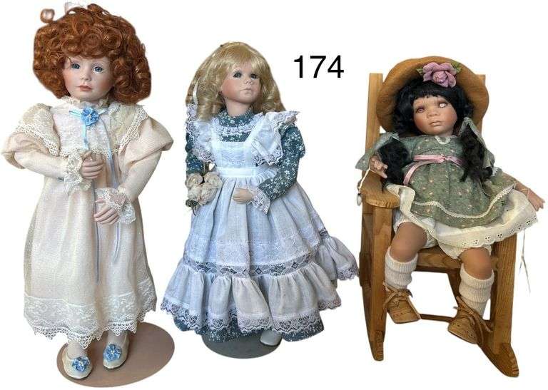 “RACHEL” DANBURY MINT BY JENNIFER SCHMIDT APPROX. 17” PORCELAIN DOLL, KENDRA BY COTTAGE COLLECTIBLES PORCELAIN DOLL (SOME DISCOLORATION IN ONE EYE) W/ WOODEN DOLL ROCKER, OTHER UNMARKED PORCELAIN DOLL APPROX. 16” image