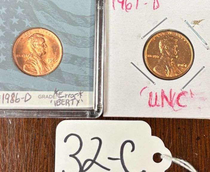 TWO LINCOLN PENNIES, 1986-D ERROR "IBERTY", NO L ON LIBERTY, 1961-D UNCIRCULATED image