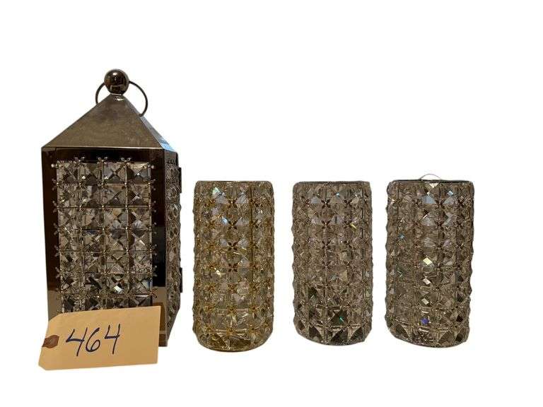 2 CHROME AND 2 POLISHED BRASS COLOR CRYSTAL STYLE CANDLE HOLDERS WITH LIGHT STRINGS INSIDE, 1 CHROME AND CRYSTAL STYLE LANTERN WITH LIGHT STRING INSIDE image