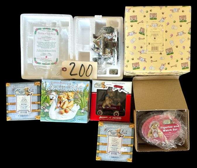 SEVEN ASSORTED CHERISHED TEDDY ITEMS TO INCLUDE BAXTER & FRIEND, TEDDIES IN A RADIO FLYER WAGON - AMERICA'S PROMISE, FIGURINE AND WATCH SET, SWAN RIDE, TEDDY'S TOY SHOP, 1999 MEMBERS ONLY 5TH ANNIVERSARY FIGURINE image