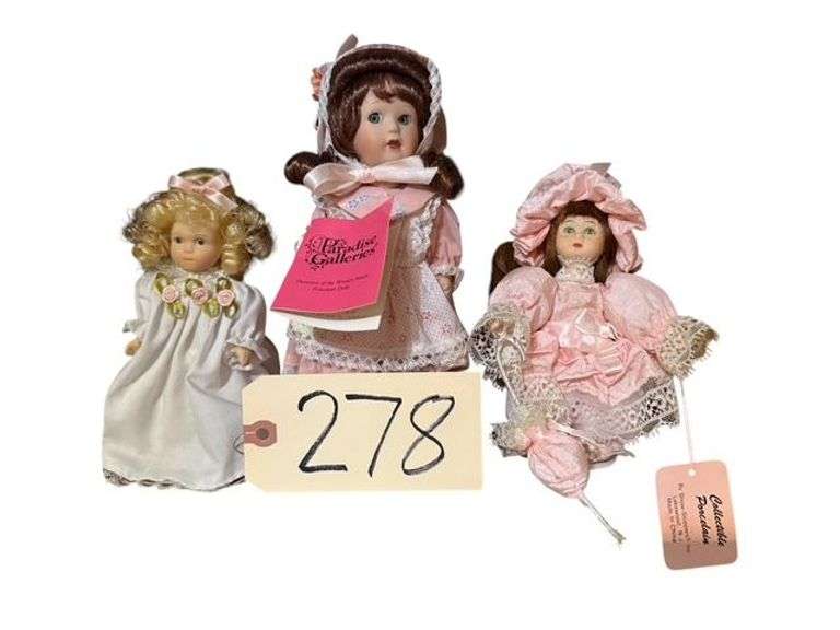 3 PORCELAIN DOLLS ON STANDS - 1 MARKED PARADISE GALLERIES, 1 MARKED SHOW STOPPERS INC., 1 UNMARKED image