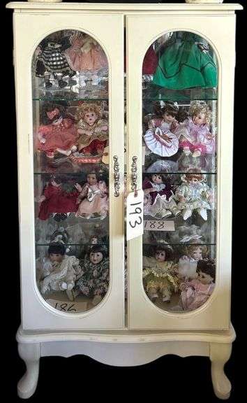 VINTAGE TWO DOOR CURIO CABINET WITH GLASS SIDES AND DOORS - HAS PROBABLY BEEN PAINTED WHITE - APP. 22 INCHES WIDE, 42 INCHES TALL - CONTENTS NOT INCLUDED image