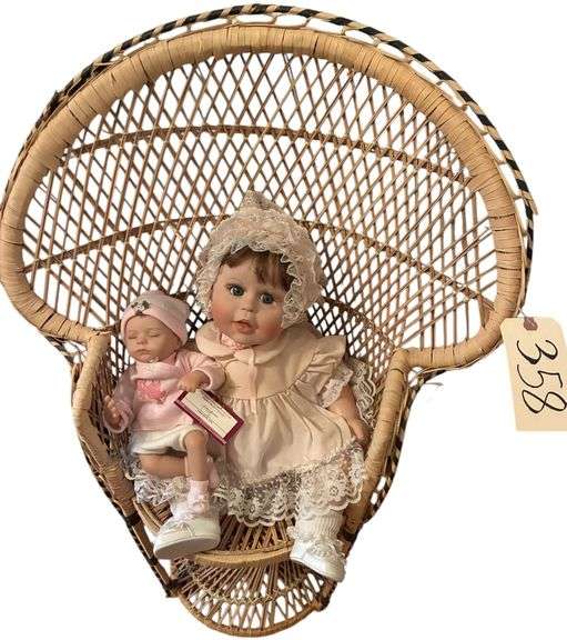 WICKER FAN-BACK CHAIR WITH 2 DOLLS - CHAIR MEASURES APPROXIMATELY 30" TALL X 23" WIDE image