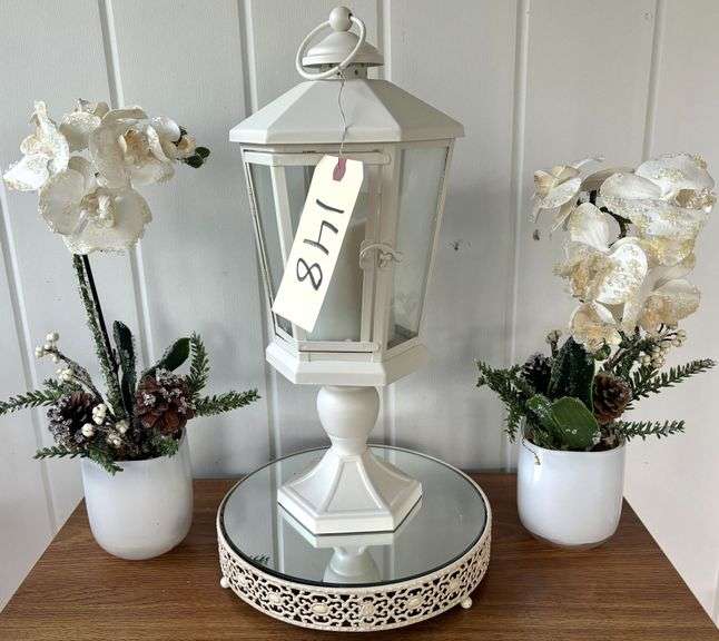 MIRRORED TRAY WITH WHITE FOOTED LANTERN AND TWO GLISTENING FLORAL ARRANGEMENTS IN WHITE VASES image