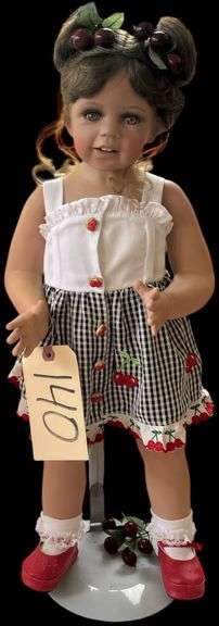 MONICA LEVENIG 24 INCH PORCELAIN DOLL WITH CHERRY DRESS AND RED SHOES, UPDO WITH CHERRY DETAIL, EXCELLENT CONDITION, MARKED ON BACK image