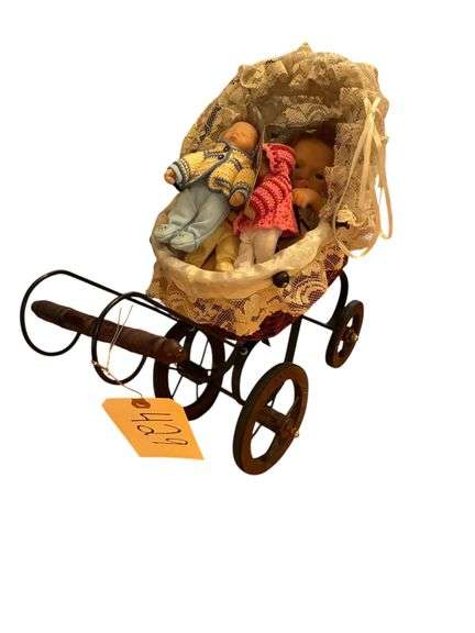 SMALL METAL BABY CARRIAGE WITH 4 SMALL DOLLS image