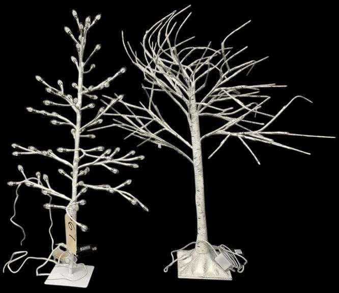 TWO WHITE PRELIT TREES - EACH ONE APPROXIMATELY 36 INCHES TALL - ONE ON RIGHT HAS A BIRCH LOOK WITH TINY LED TYPE LIGHTS, ONE ON LEFT HAS LARGER LIGHTS image