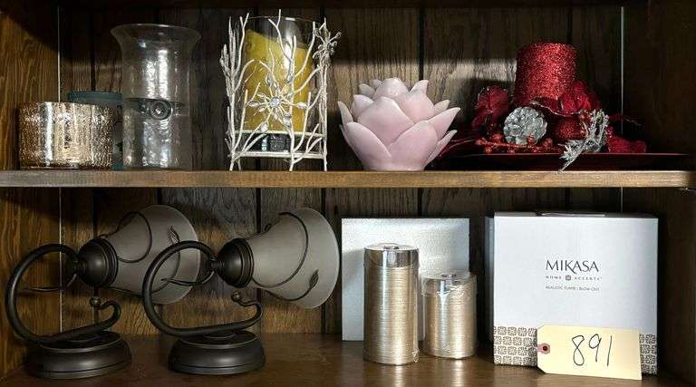 TWO SHELVES OF NICE, MISCELLANEOUS ITEMS TO INCLUDE TWO BATTERY OP WALL SCONCES, TWO MIKASA CANDLES WITH BOX, OTHER ASSORTED CANDLES image