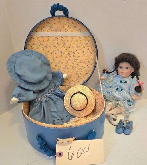 12" PORCELAIN DOLL WITH OUTFIT CHANGE AND CARRYING CASE image