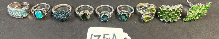 9 STERLING SILVER RINGS W/ GREEN STONES, SOME EMERALD AND OTHERS, VARYING STYLES OF RINGS - 1.43 TROY OZ, 44.48 GRAMS INCLUDING STONES - SIZES RANGE FROM 6-8 image