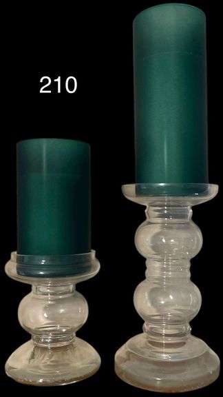 TWO HEAVY GLASS PILLAR CANDLE STANDS WITH CANDLES AND GREEN GLASS SHADES - TALLEST IS APP. 16.25 INCHES IN HEIGHT image