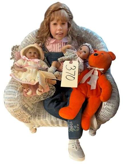 TODDLER SIZE WICKER CHAIR WITH 3 DOLLS AND TEDDY BEAR - CHAIR MEASURES 18.5" TALL IN THE BACK BY 19" WIDE - INCLUDES 30" ASHTON DRAKE "HANNAH" VINYL DOLL (CENTER), UT BEAR image