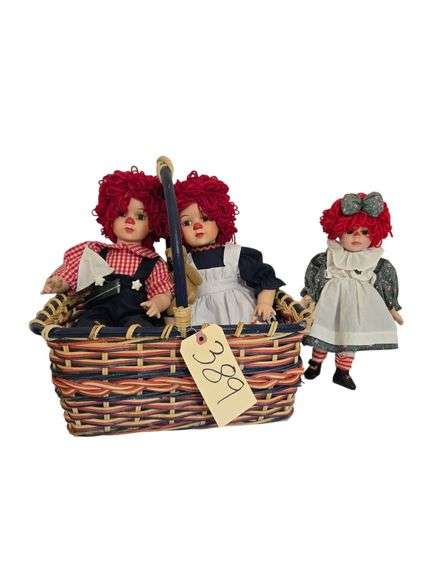 NICE WOVEN HANDLED BASKET W/ RAGGEDY ANN & ANDY DOLLS APPROX. 11” SITTING HEIGHT, OTHER CLOWN DOLL APPROX. 12” TALL W/ METAL STAND image