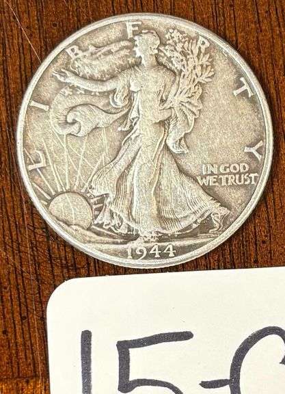 WARTIME 1945 WALKING LIBERTY SILVER HALF DOLLAR, GOOD DETAILS, IN PLASTIC DISPLAY HOLDER image