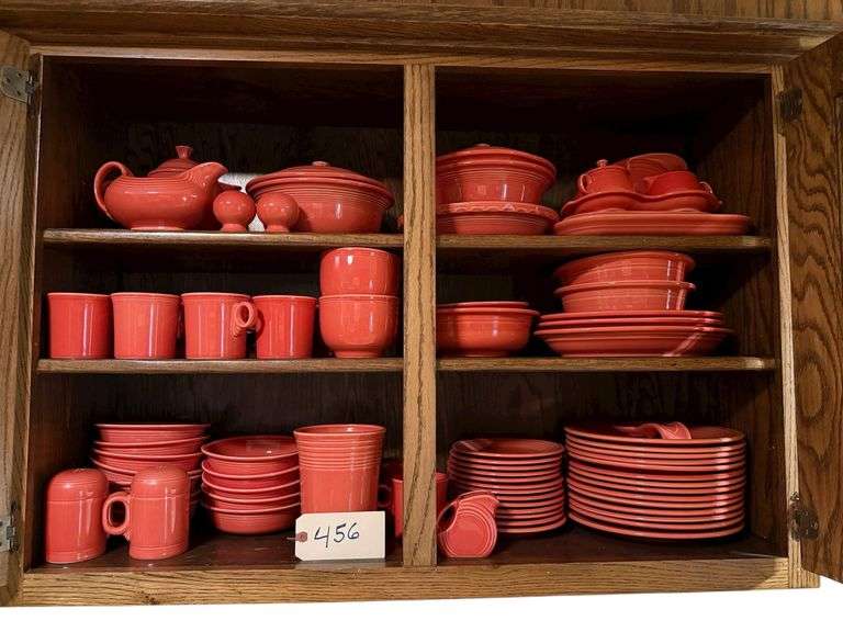 FIESTA DISHES: 14 DINNER PLATES, 13 SALAD/BREAD PLATES, 12 CEREAL BOWLS, 14 COFFEE MUGS, 2 SOUP BOWLS, 5 SERVING BOWLS, 3 SERVING PLATTERS, 1 LARGE RELISH TRAY, 2 SMALL RELISH TRAYS, WATER PITCHER, 2 COVERED BAKING DISHES, LARGE AND SMALL PIE PLATES, COFFEE POT, LARGE SALT AND PEPPER SHAKERS, SMALL SALT AND PEPPER SHAKERS, SPOON REST, CREAM AND SUGAR WITH TRAY, GRAVY BOAT, UTENSIL CROCK, 5 OUNCE MINI DISK PITCHER image