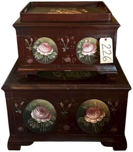TWO STACKING HAND PAINTED LIDDED TRUNKS PLUS MATCHING TRAY: LARGE TRUNK IS 16" TALL, 24" WIDE, 16" DEEP - SMALLER IS 11.5" TALL, 12.75" WIDE, 19.5" DEEP - DEEP RED WITH FLORAL MOTIF image