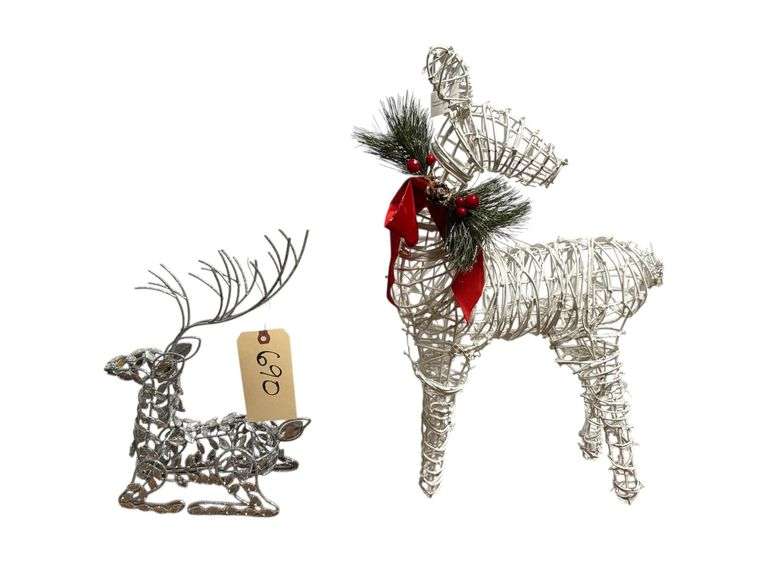 1 STANDING WHITE REINDEER AND 1 KNEELING SILVER COLORED REINDEER image