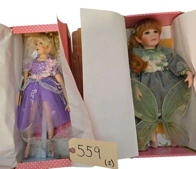 2 PARADISE GALLERIES PORCELAIN DOLLS APPROX. 14”: “SUGAR PLUM FAIRY”, “TREASURE OF EMERALD ISLE image