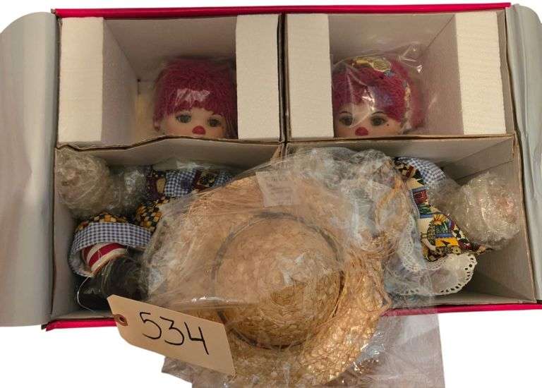 “TWINS” PAIR OF PORCELAIN DOLLS BY MARIE OSMOND NEW IN BOX APPROX. 10.5” SITTING HEIGHT - “LITTLE BIT COUNTRY KISSES AND HUGS” image