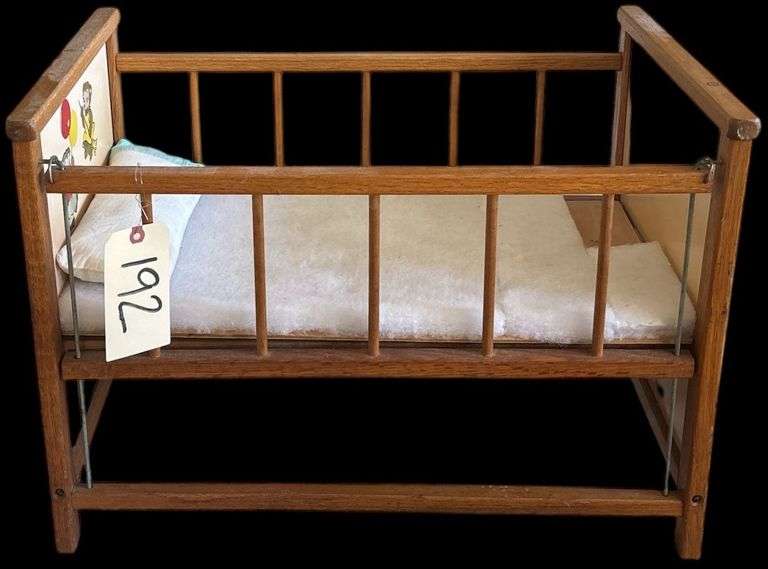 VINTAGE DROP SIDE DOLL SIZE BABY BED/CRIB WITH APPLIED GRAPHICS (APP. 24 INCHES LONG) image