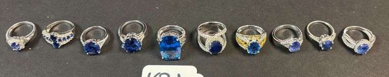 LOT OF 10 STERLING SILVER RINGS W/ TOPAZ AND SAPPHIRE STONES - 48.19 GRAMS, 1.54 TROY OZ INCLUDING STONES - SIZES RANGING FROM 5 TO 7 image