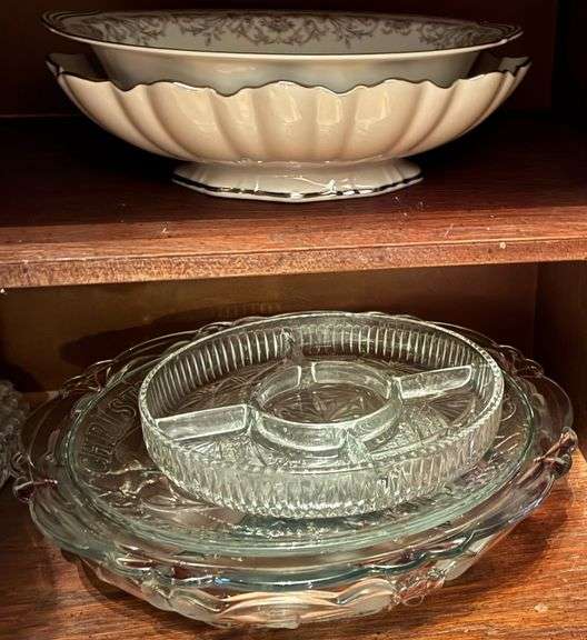 14 ITEMS IN LOT INCLUDE ONE OVAL LENOX SERVING BOWL, ONE PINK DEPRESSION GLASS VEGETABLE BOWL, ONE HAND-PAINTED IN HUNGARY COVERED SOUP TUREEN, LARGE LEAD CRYSTAL SERVING BOWL, 4 LARGE GLASS SANDWICH PLATTERS, ONE CERAMIC SNOWMAN SERVING PLATTER, TWO GLASS DIVIDED DISHES, 1 PATTERN GLASS FOOTED BUTTER MISSING THE LID, NORITAKE CHINA FINE CHINA, CRYSTAL BELL image